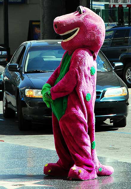 Barney impersonator on Hollywood Boulevard in front of the Kodak Theater, Monday, September 15, 2008