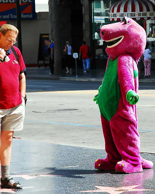 Barney impersonator on Hollywood Boulevard in front of the Kodak Theater, Monday, September 15, 2008