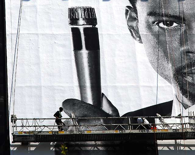 Workers applying building wrap, Sunset Strip, West Hollywood