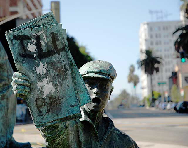 Harrison Gray Otis memorial, Wilshire and Park Place, MacArthur Park, Los Angeles - newsboy