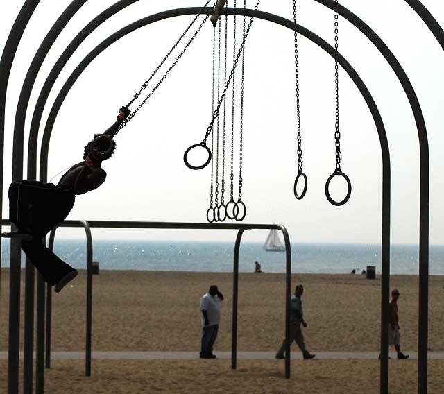 Man on Rings - Santa Monica - the beach south of the pier