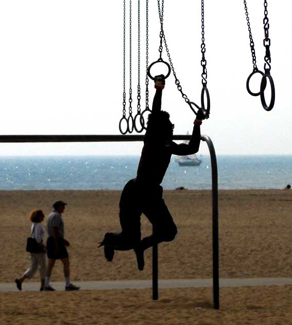 Man on Rings - Santa Monica - the beach south of the pier