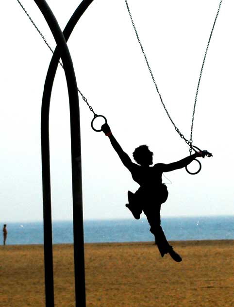 Man on Rings - Santa Monica - the beach south of the pier