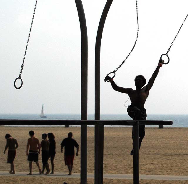 Man on Rings - Santa Monica - the beach south of the pier