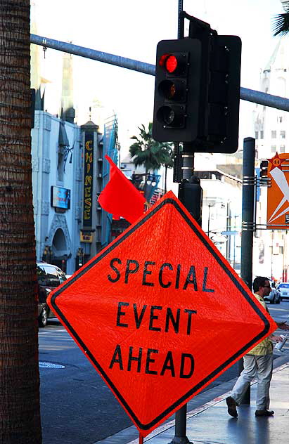 "Special Event Ahead" - sign on Hollywood Boulevard, Chinese Theater in background 