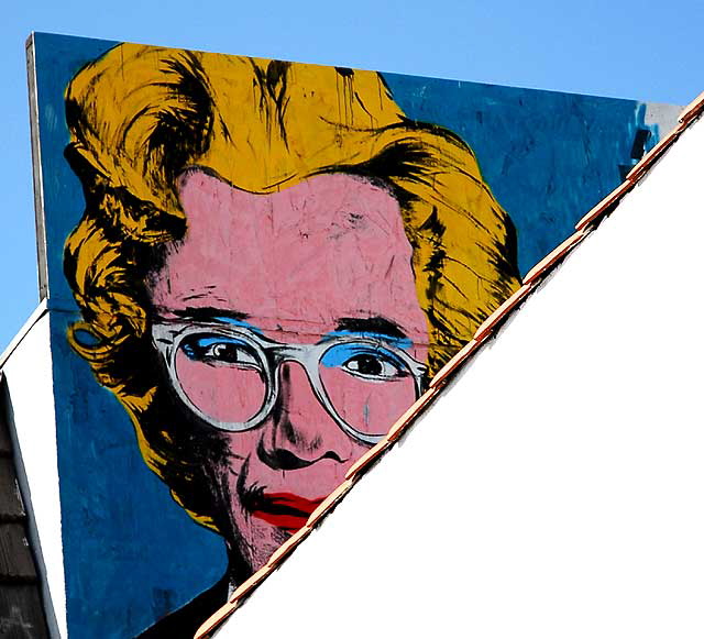 Woman with glasses graphic over Melrose Avenue