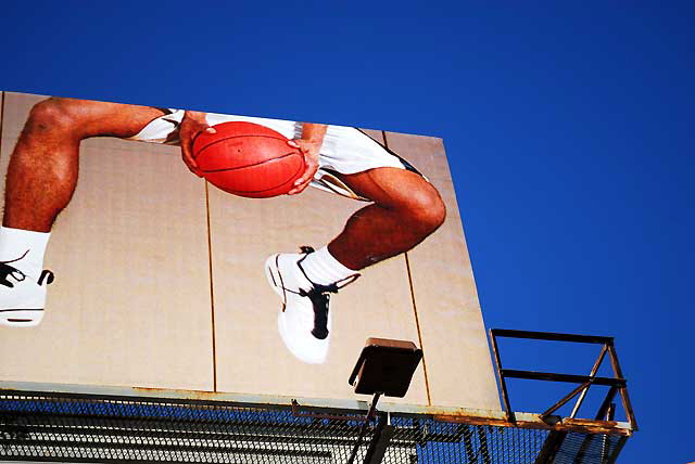 Basketball billboard, La Brea, a block north of San Vicente, West Los Angeles