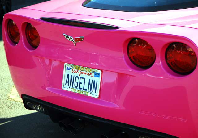 Angelyne's pink Corvette parked in a lot on Las Palmas, behind Central Hollywood