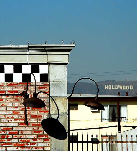 The Hollywood Sign as seen from Santa Monica Boulevard at Hudson