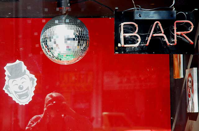 Disco Ball, Neon Bar Sign, Clown Face - window on Hollywood Boulevard