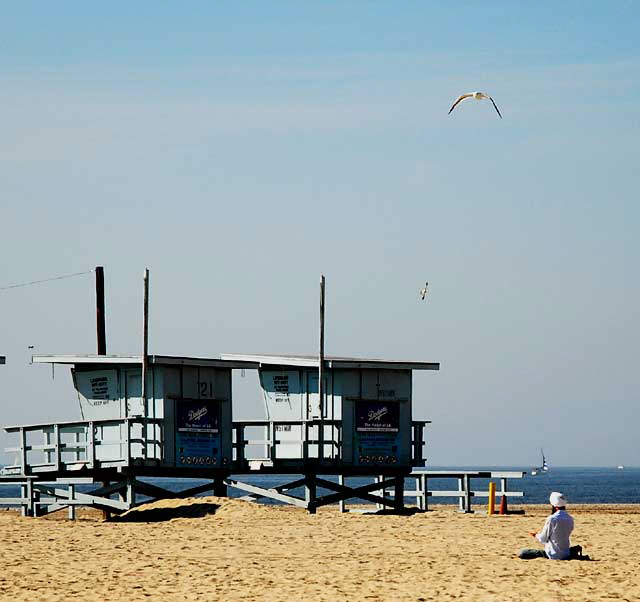 Man in turban in Lotus Position, meditating - Venice Beach