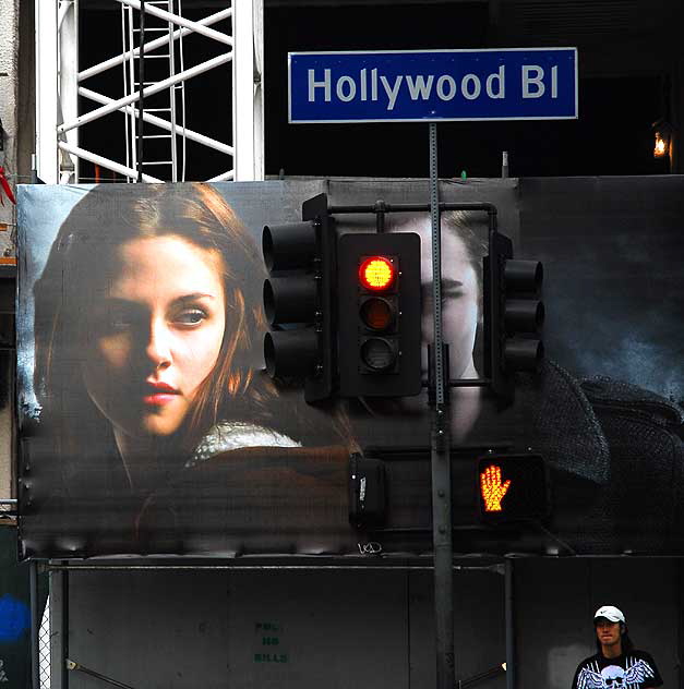 "Twilight" billboard with pedestrian, Hollywood Boulevard at Orange