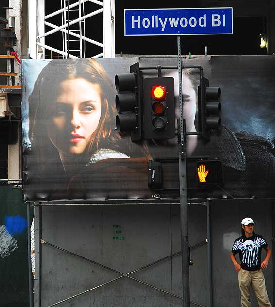 "Twilight" billboard with pedestrian, Hollywood Boulevard at Orange