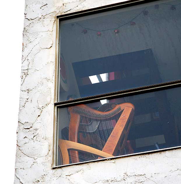 Harps in window, Marina Peninsula, just south of Venice Beach