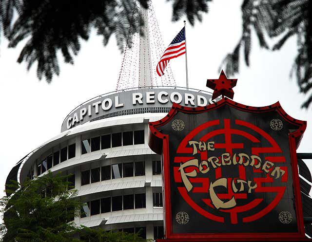 Capitol Records Building on Vine, Hollywood - Forbidden City restaurant sign in foreground 