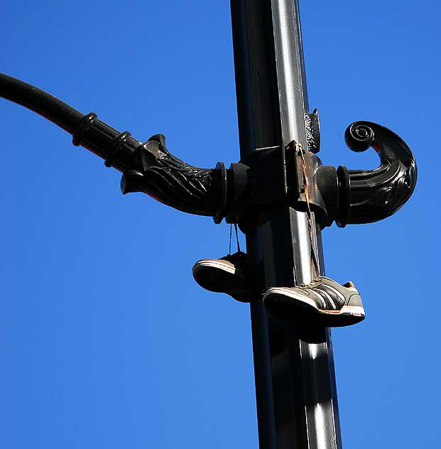 Sneakers handing from lamppost, Hollywood Boulevard