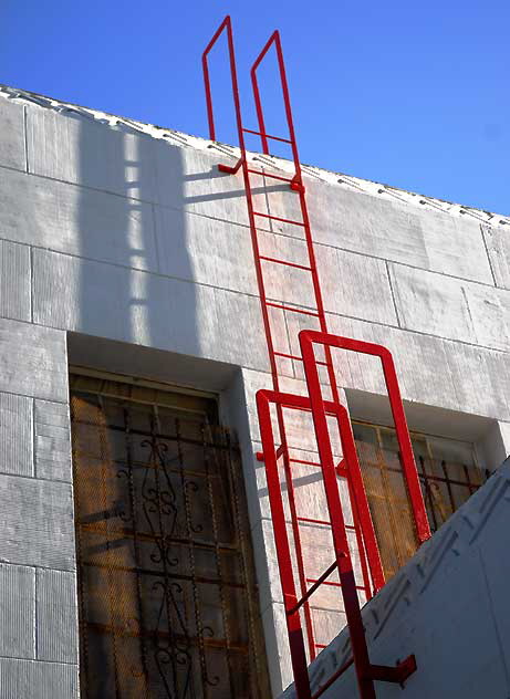 Red Ladder, Blue Wall