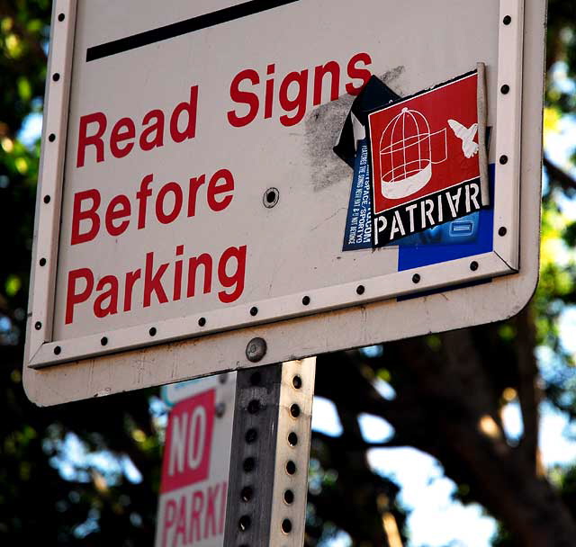 Sticker on parking warning, Sunset Strip, West Hollywood