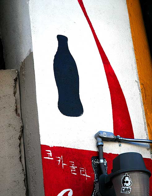 Red signage, stucco wall - Hollywood Boulevard