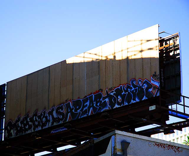 Billboard with graffiti message - La Brea Boulevard, Hollywood