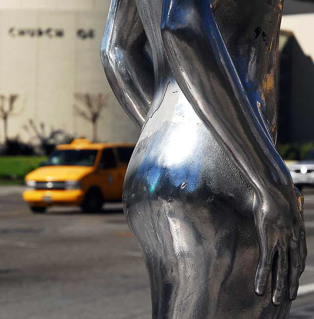 Silver figure at Hollywood Gateway, Hollywood Boulevard at La Brea