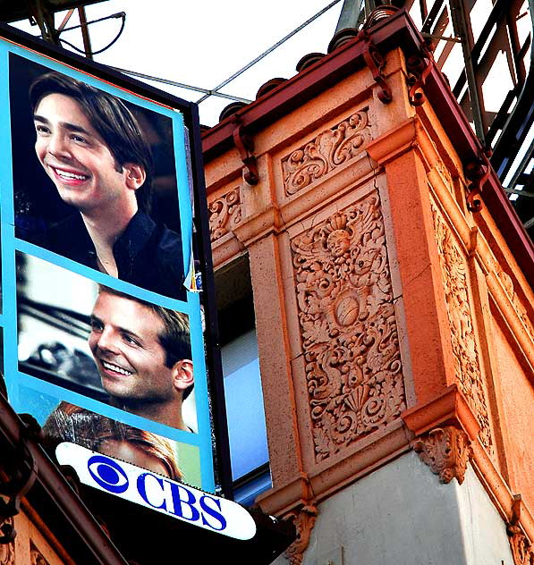 Billboard faces and Colonial Revival apartment building on Wilshire Boulevard, Los Angeles