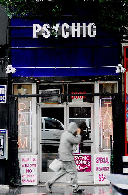 Psychic shop, Hollywood Boulevard at Wilcox - pedestrian dodging rain