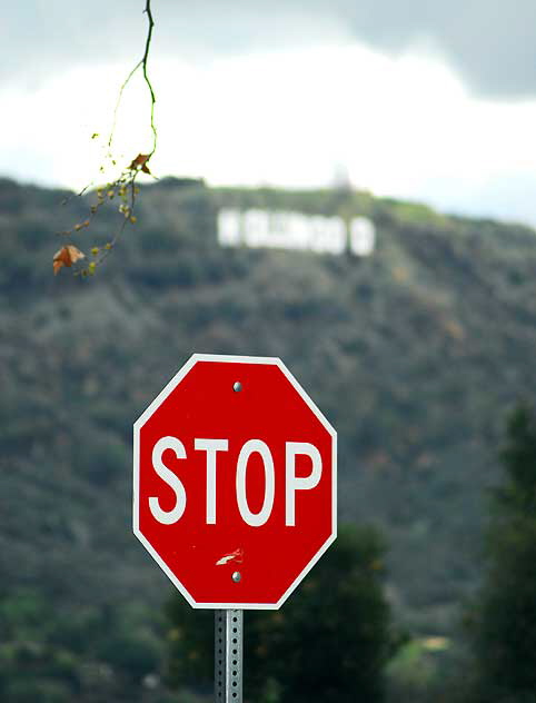 Stop sign and Hollywood Sign