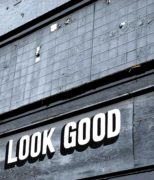 "It Pays to Look Good" - sign at old barbershop, Sunset Junction