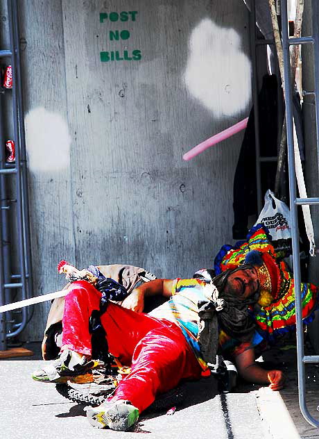 Man in pirate costume asleep on Hollywood Boulevard