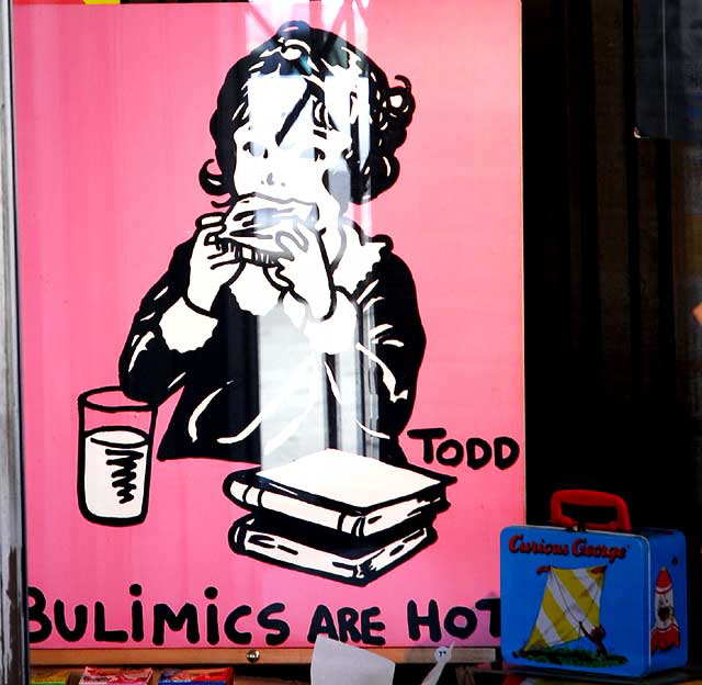 "Bulimics Are Hot" - pop art poster in gallery window on Hollywood Boulevard