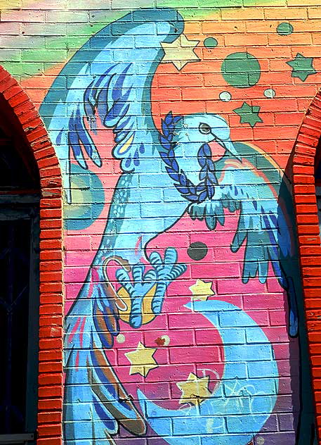 Blue bird painted in brick wall, Ocean Front Walk, Venice Beach