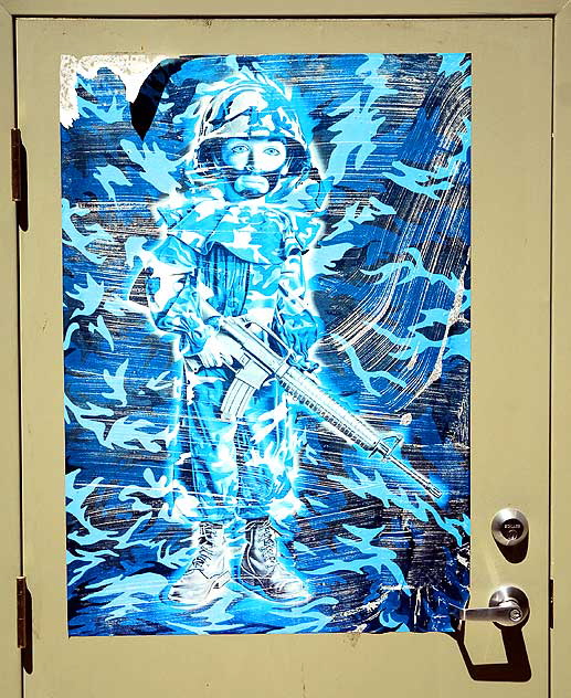 Blue Clown Soldier - poster in an alley off Cherokee in Hollywood