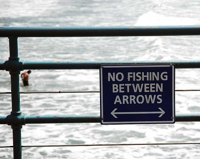 Warning sign for fishermen on the Santa Monica Pier