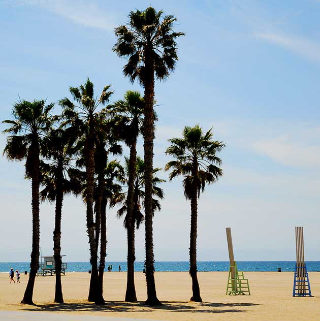 Palms and giant chairs, just south of the Santa Monica Pier