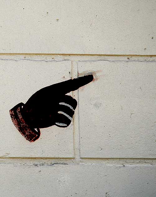 Finger on Wall