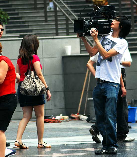 Asian cameraman at Chinese Theater, Hollywood Boulevard