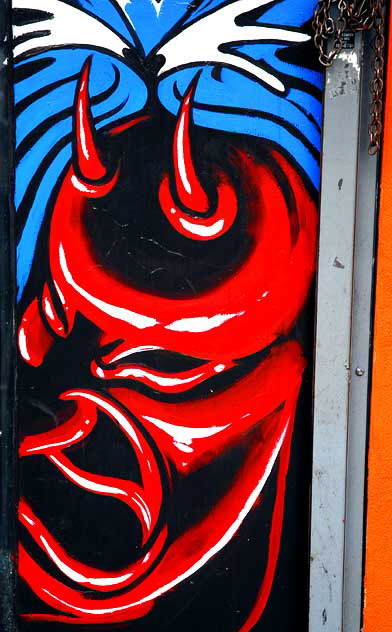 Devil painted on doorway, tattoo shop, Hollywood Boulevard