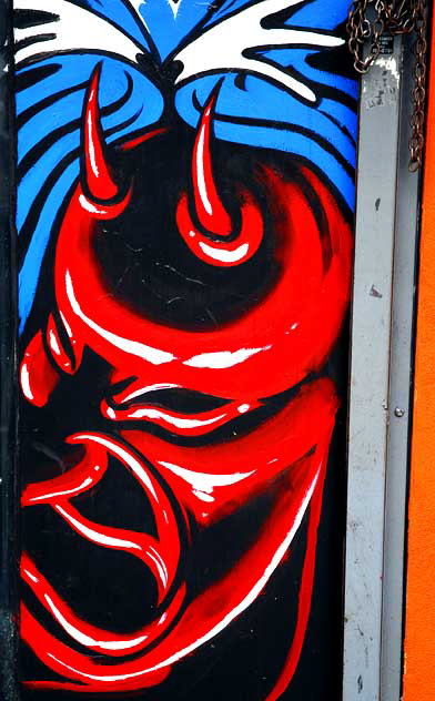 Devil painted on doorway, tattoo shop, Hollywood Boulevard