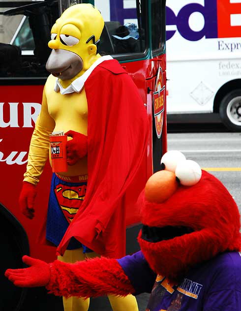 Homer Simpson impersonator, Hollywood Boulevard, with Oscar the Grouch