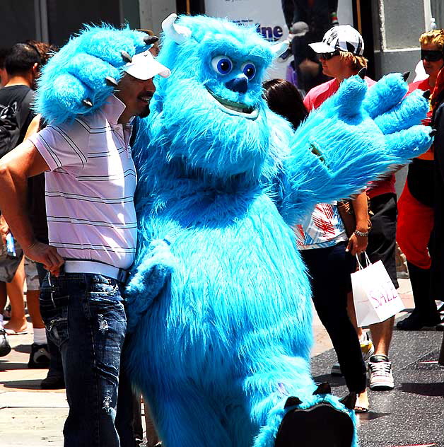 Impersonator in front of the Chinese Theater on Hollywood Boulevard - Blue Monster