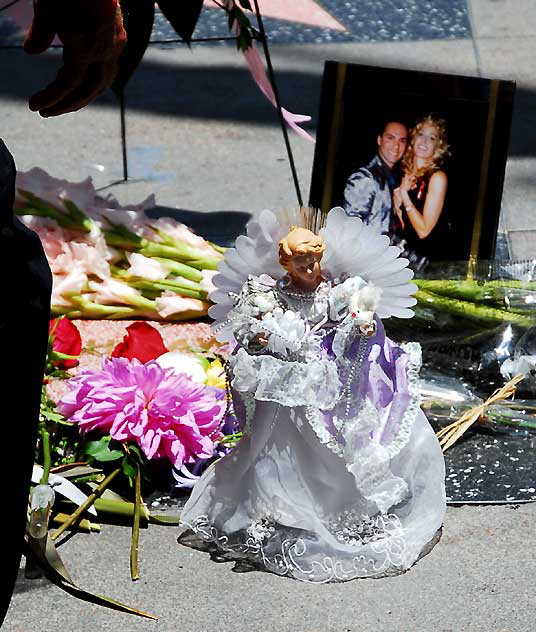 The scene at Farah Fawcett's star on the Hollywood Walk of Fame - on the northwest corner of Hollywood Boulevard and Sycamore - the day of her death, Thursday, June 25, 2009