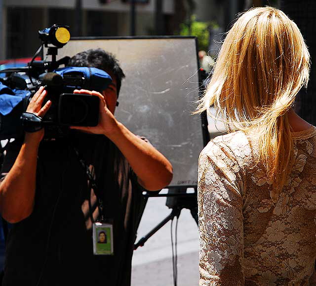 The scene at Farah Fawcett's star on the Hollywood Walk of Fame - on the northwest corner of Hollywood Boulevard and Sycamore - the day of her death, Thursday, June 25, 2009