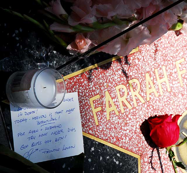 The scene at Farah Fawcett's star on the Hollywood Walk of Fame - on the northwest corner of Hollywood Boulevard and Sycamore - the day of her death, Thursday, June 25, 2009