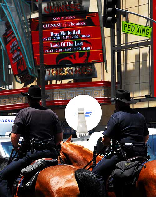 The scene on Hollywood Boulevard on Friday, June 26, 2009 - the day after the death of Michael Jackson - LAPD horses