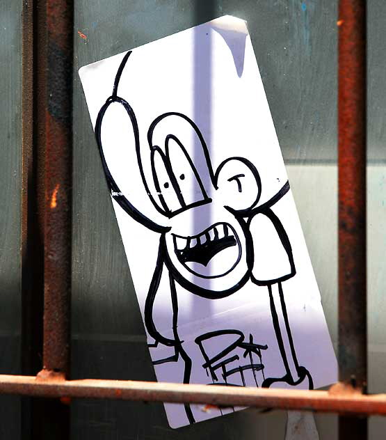 Sticker in window, Melrose Alley 