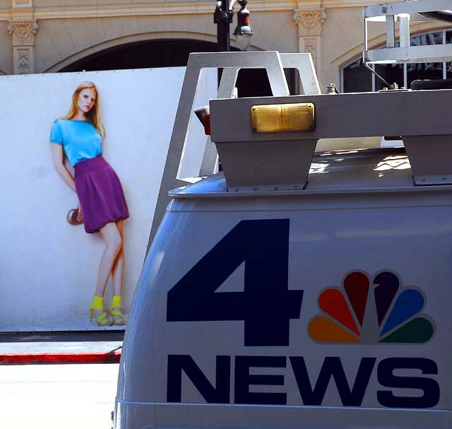 News van and billboard, Hollywood Boulevard