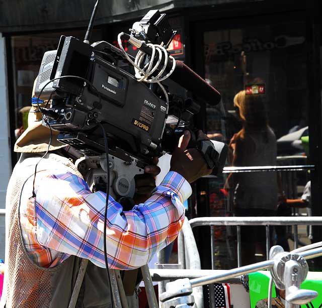 News cameraman shooting Michael Jackson's star on Walk of Fame, at Grauman's Chinese Theater, Hollywood, on the day of his memorial service at Staples Center