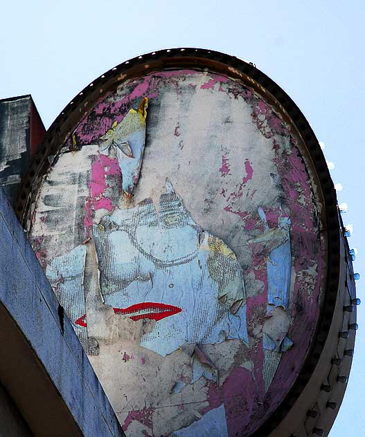 Ratty face in marquee, Hollywood Boulevard