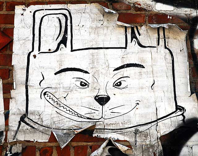 Grinning Cat - graphic in an alley off La Brea at First, Los Angeles